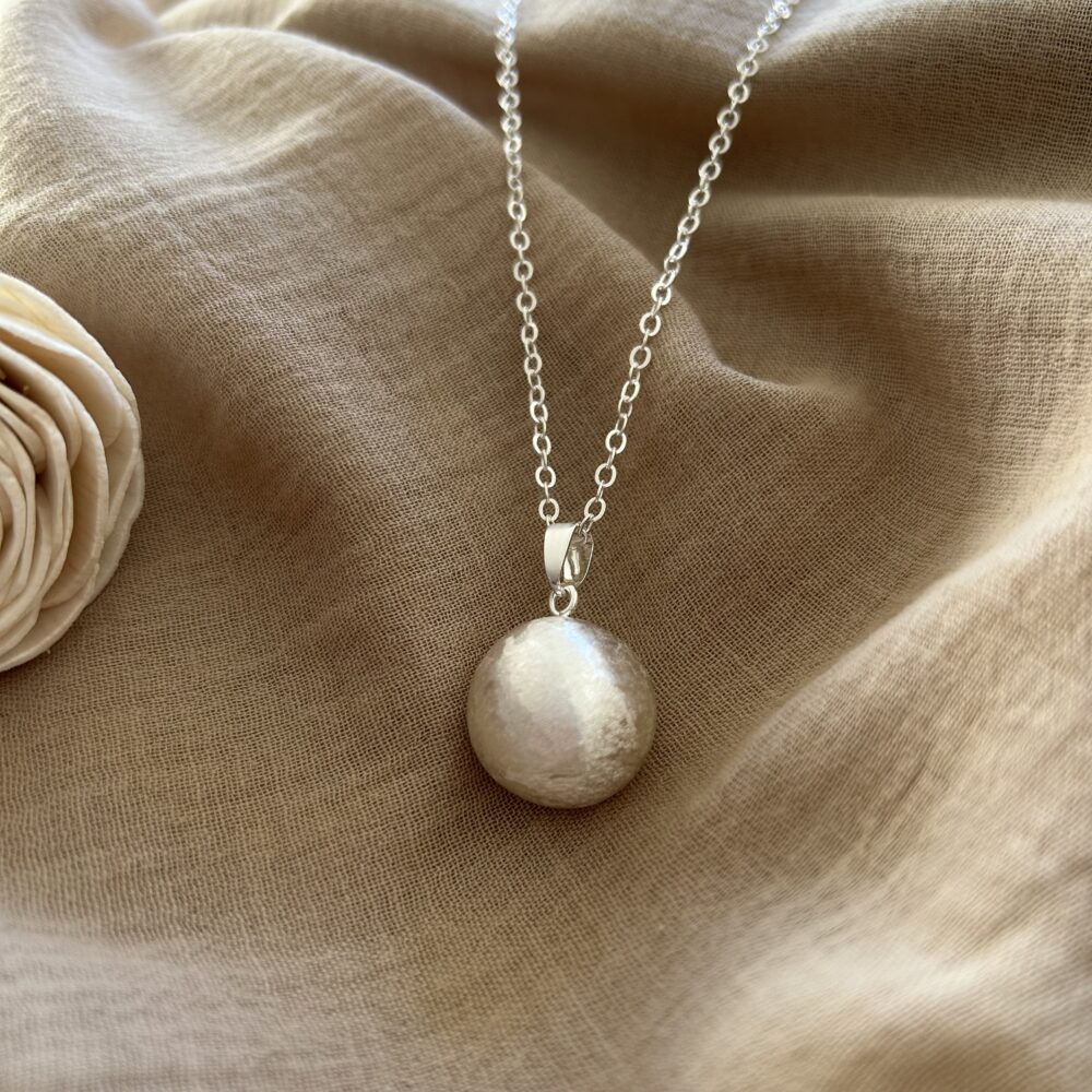 bola de grossesse en argent