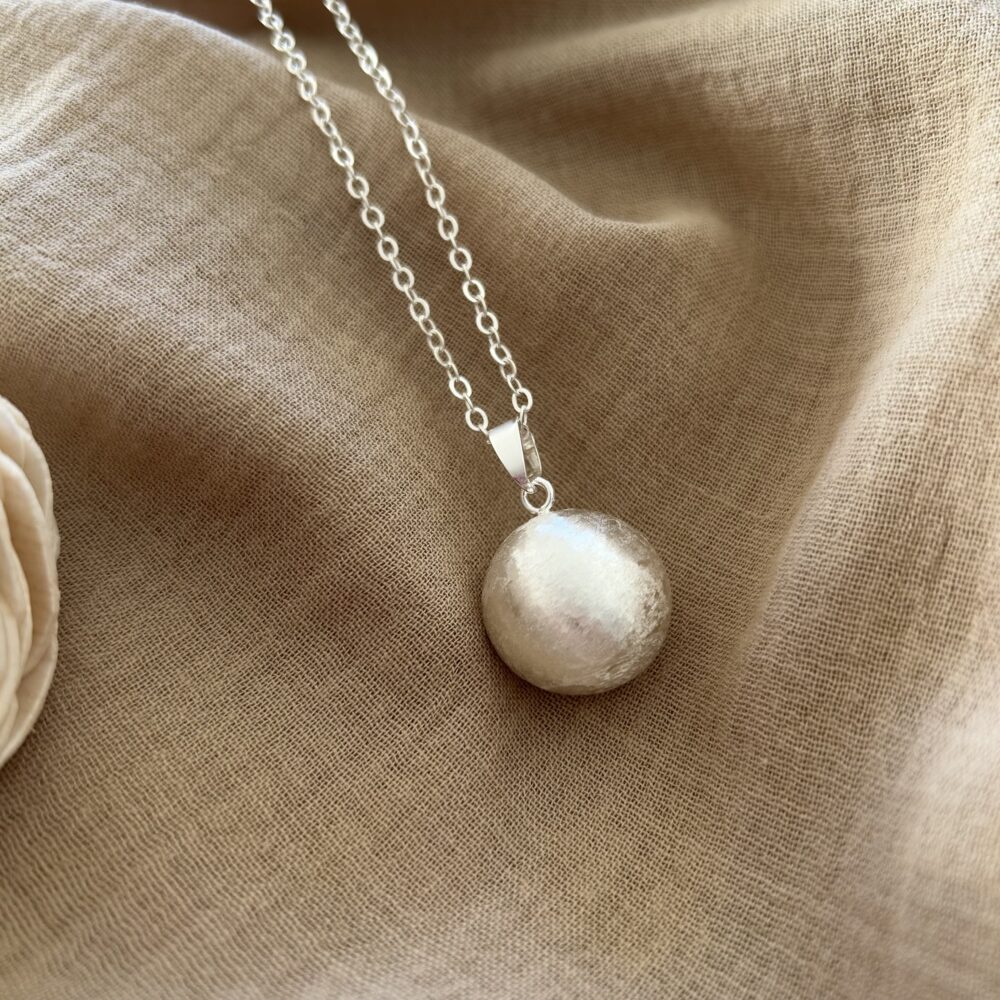 bola de grossesse en argent