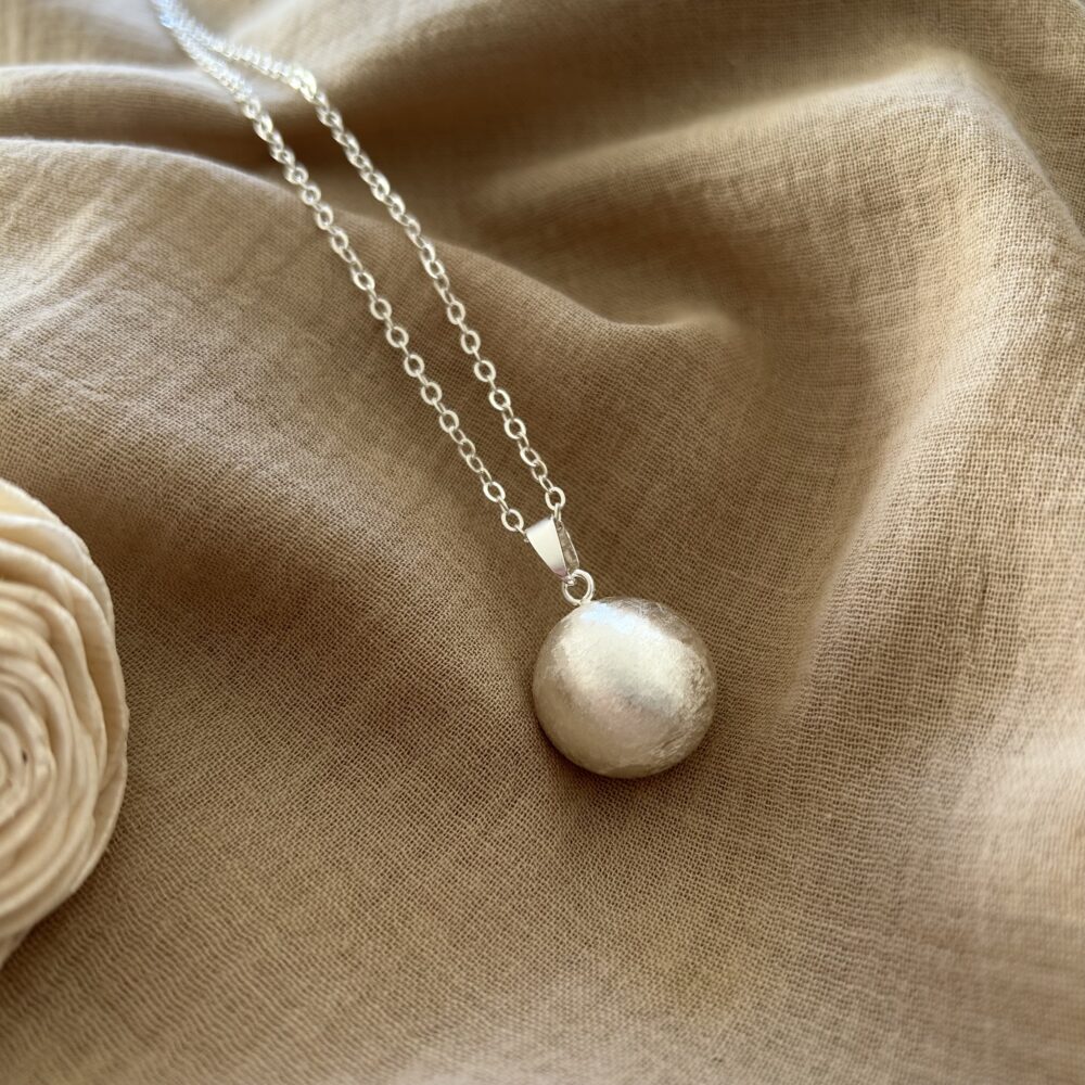bola de grossesse en argent