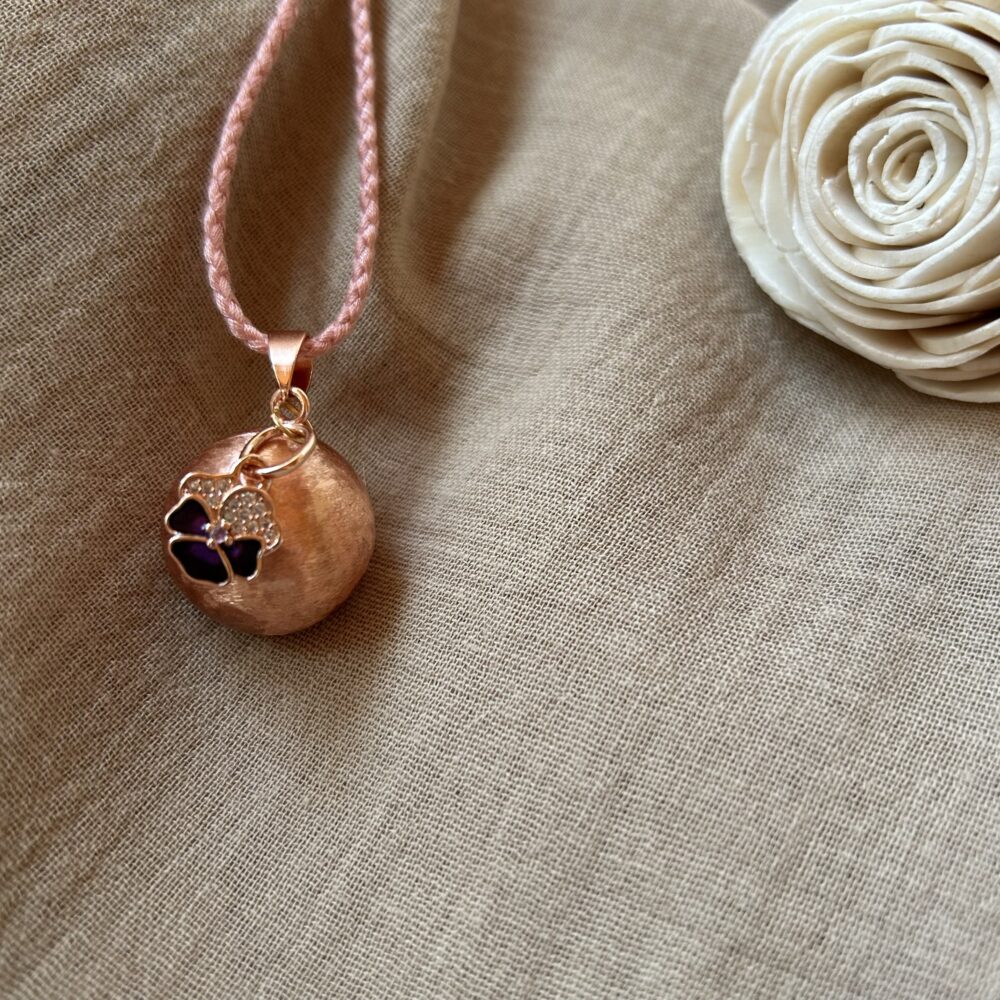 bola de grossesse or rose cordon rose
