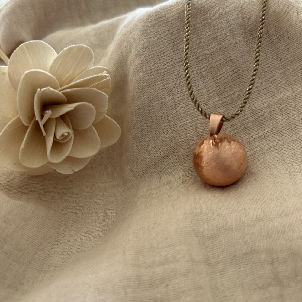 bola de grossesse or rose cordon doré