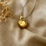 llamador de ángeles con cordón Isolda de oro