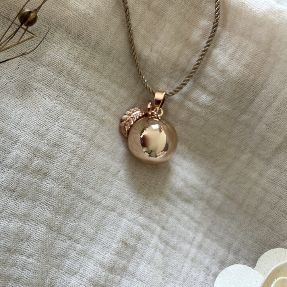 bola de grossesse or rose cordon doré