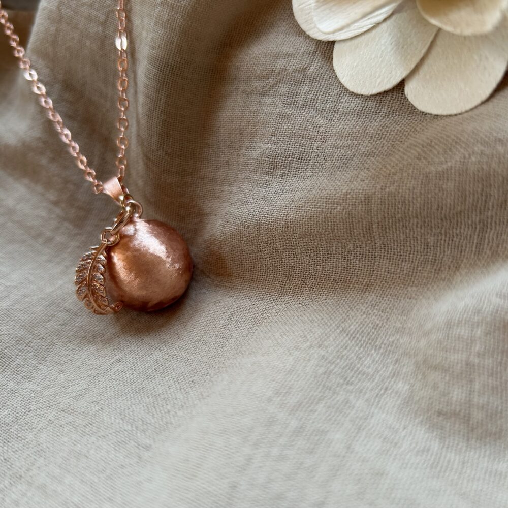 bola de grossesse or rose plume