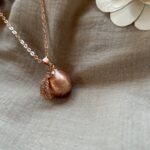 Luma llamador de ángeles de oro rosa
