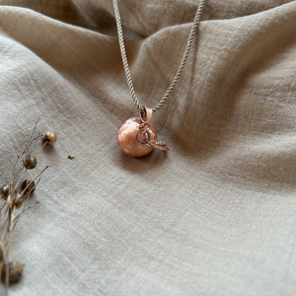 bola de grossesse or rose avec cordon doré