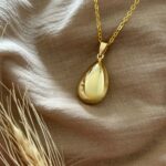 llamador de ángeles de oro Lana